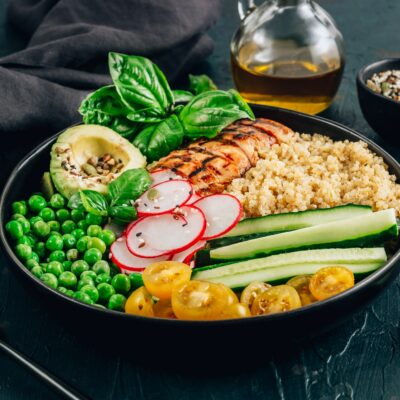 Healthy salad bowl with quinoa and chicken