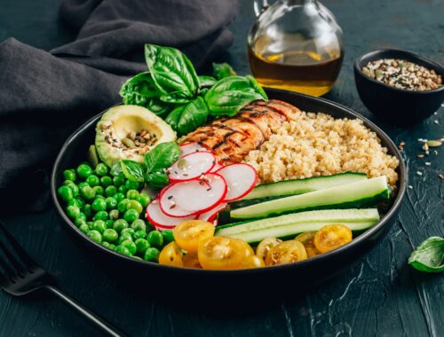 Healthy salad bowl with quinoa and chicken