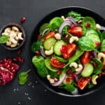 Spinach salad with vegetables and nuts